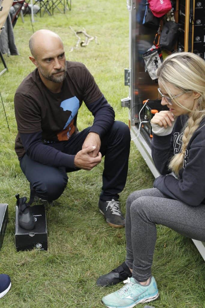 Shmulsky helps a customer find the perfect pair of climbing shoes. Photo by Alexis Dionne Ali